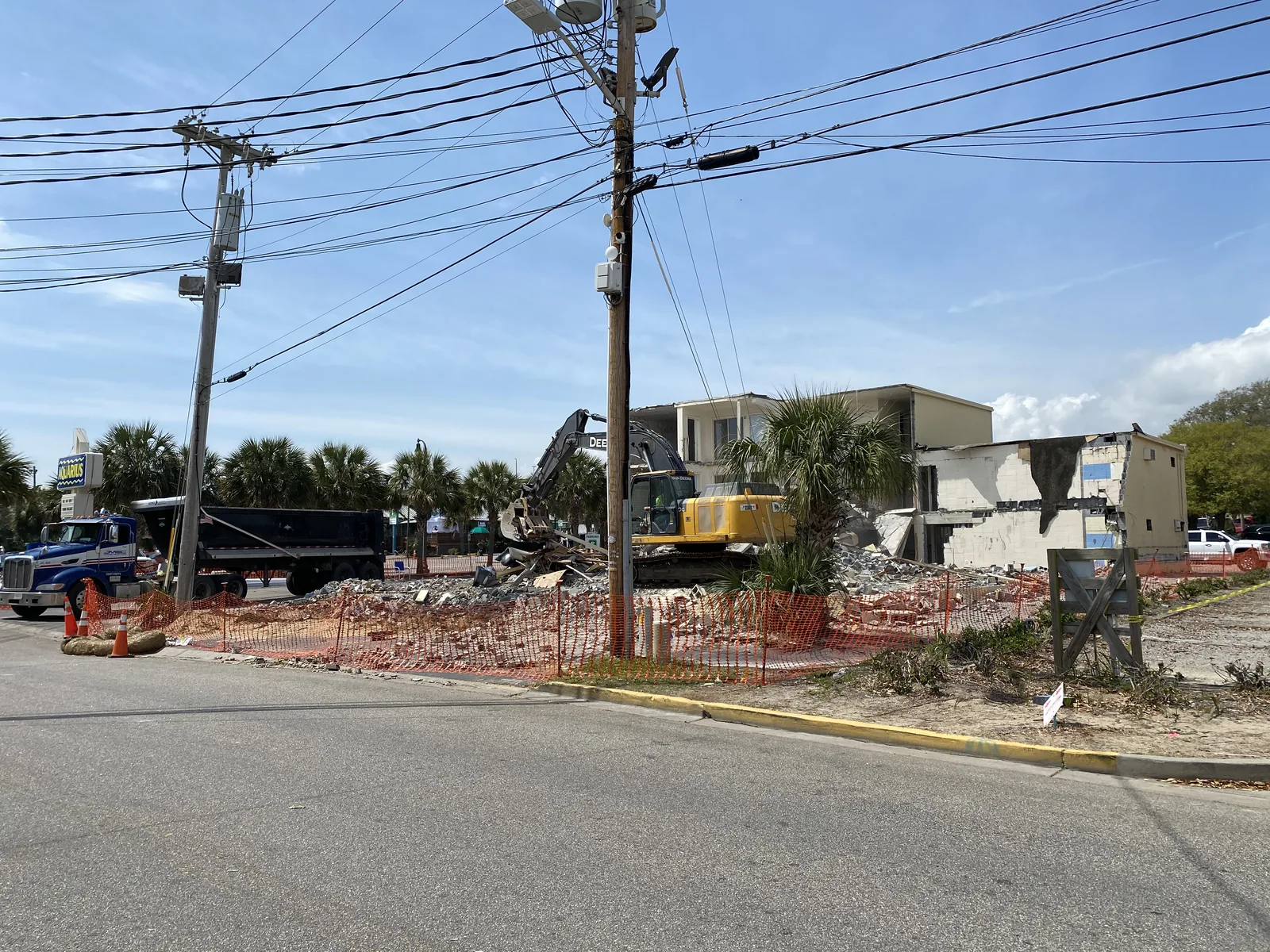 Commercial property prepared for demolition along a public roadway