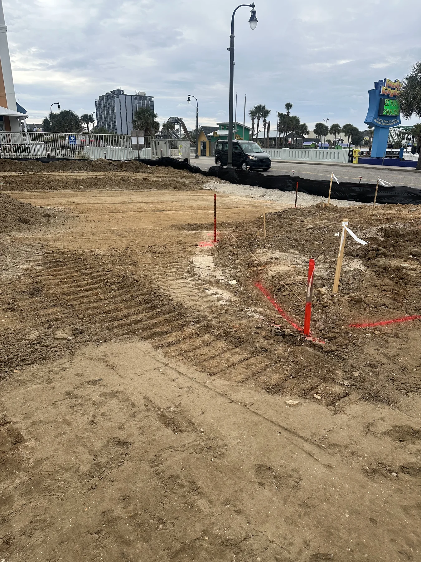 Fine grading and site preparation for a building pad